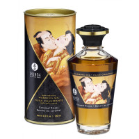 Съедобное согревающее массажное масло Aphrodisiac Warming Oil Caramel Kisses 100 мл Съедобное согревающее массажное масло Aphrodisiac Warming Oil Caramel Kisses 100 мл