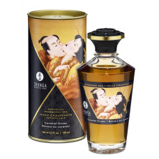 Съедобное согревающее массажное масло Aphrodisiac Warming Oil Caramel Kisses 100 мл Съедобное согревающее массажное масло Aphrodisiac Warming Oil Caramel Kisses 100 мл